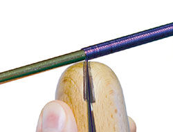 Wire clamp on the end of coiled wire